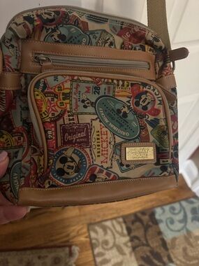 Disney Mickey Mouse Multi-Color Badge Print Crossbody with Tan Trim